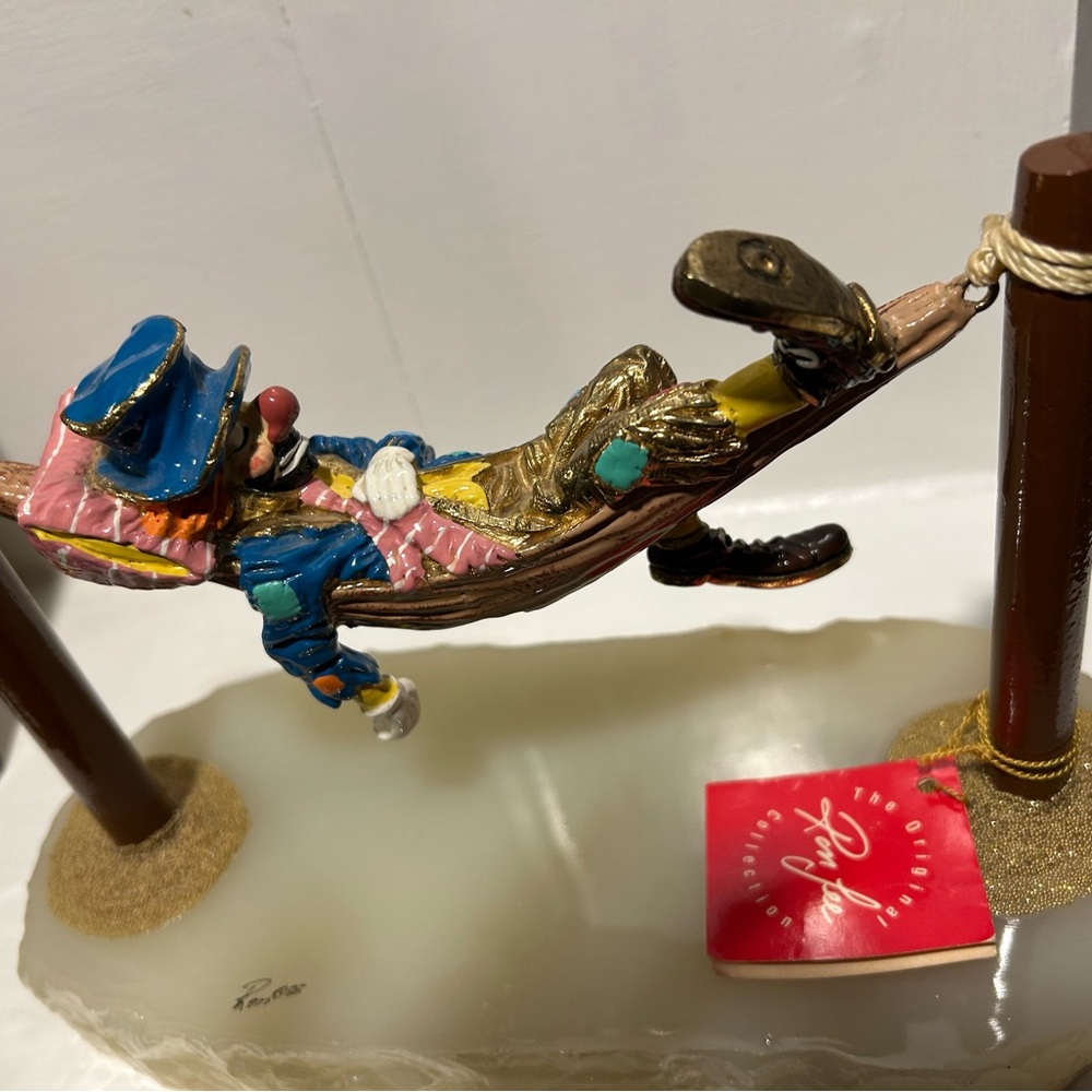 Ron Lee hand painted collectible clown in hammock.